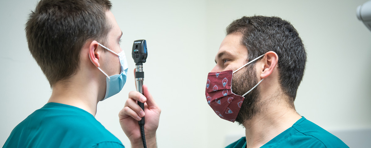 Nursing student practicing on other student