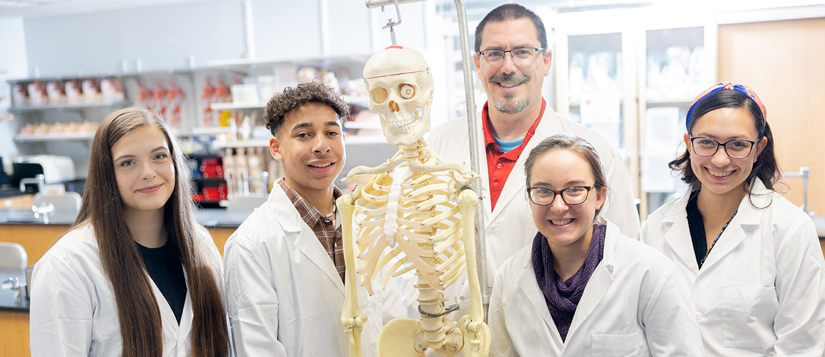 Natural science students with professor 